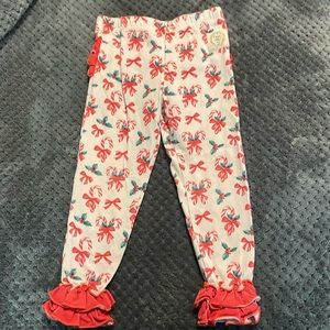 Olive Mae cute candy cane leggings.